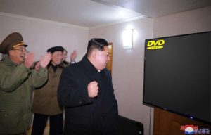 Kim Jong Un Looking at TV Political meme template