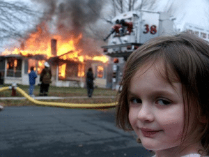 Girl in front of burning house IRL meme template