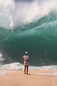 Woman about to be hit by giant wave vs meme template