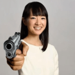 Sparks Joy woman pointing a gun  meme template blank at-you, Marie Kondo