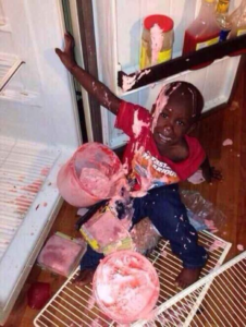 Black kid covered in ice cream Erin meme template
