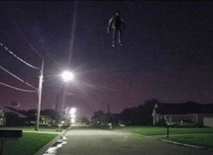 Floating man over neighborhood at night Scary meme template