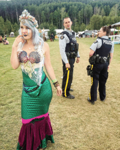 Distracted cop looking at mermaid IRL meme template