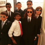 Kids in suits with brown kid Wholesome meme template blank  CIA, FBI, Secret Service, Protecting, Guarding, Desi