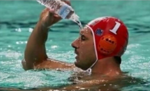Man in pool pouring water on himself Cobra Kai Drinking search meme template