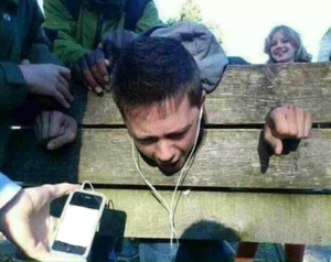 Forcing someone to listen to music in stockade Prison meme template