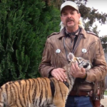 Tiger snuggling with Joe Exotic Tiger King meme template blank  Tiger King, Joe Exotic, Tiger, Snuggling, Wholesome, Happy, Baby, Kitten, Cat, Animal
