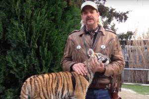 Tiger snuggling with Joe Exotic  Tiger King meme template