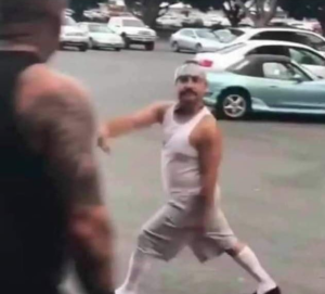 Short Mexican man squaring up to fight IRL meme template
