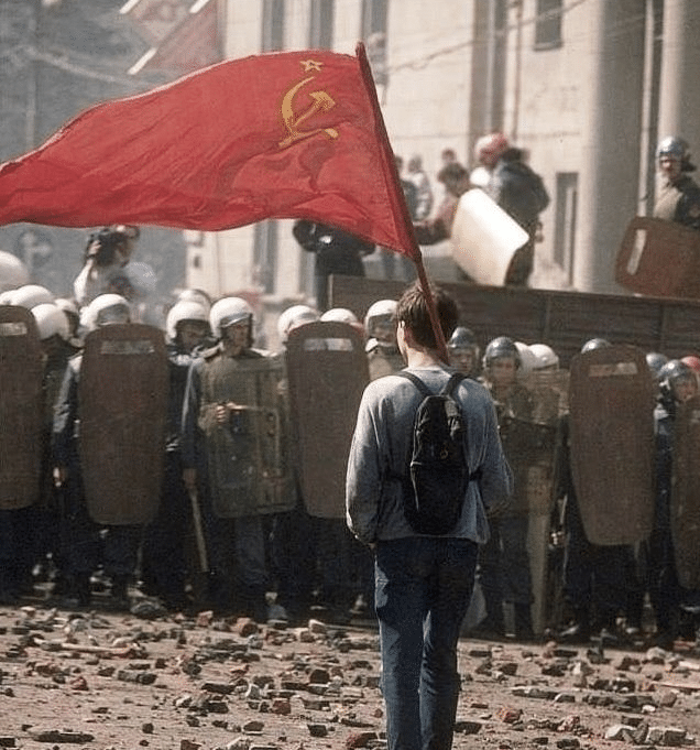 Meme Generator - Kid with communist flag in front of riot police