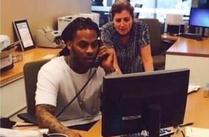 Black man helping white woman with computer  * meme template