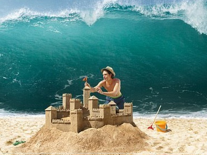 Building a sand castle in front of a giant wave  Vs meme template