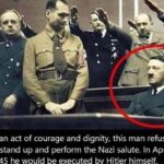 History Memes History,  text: In an act of courage and dignity, this man refuses to stand up and perform the Nazi salute. In April  History, 