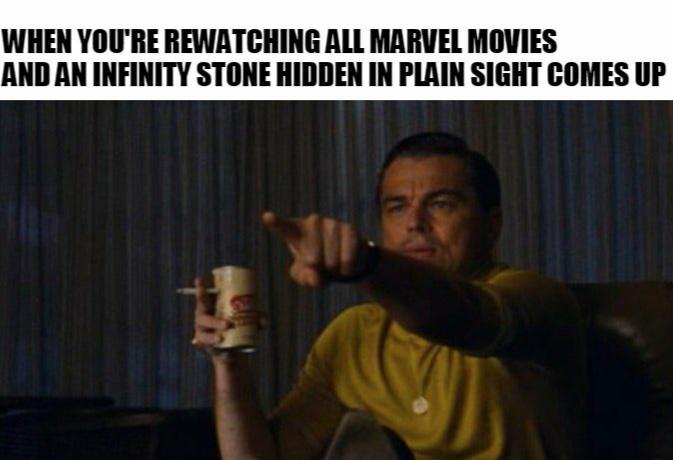 Thanos, Aether, Tesseract, Reality Stone, Collector, Tony Avengers Memes Thanos, Aether, Tesseract, Reality Stone, Collector, Tony text: WHEN YOU'RE REWATCHING AU MARVEL MOVIES AND AN INFINITY STONE HIDDEN IN SIGHT COMES UP 