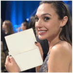 Gal Gadot holding paper Holding Sign meme template blank  Holding Sign, Gal Gadot, Opinion, Smiling, Woman