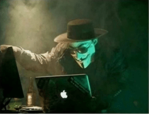 Anonymous using computer Stock Photo meme template