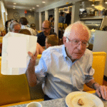 Bernie Sanders holding paper Political meme template blank