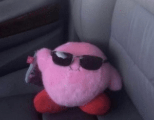 Kirby sitting in car IRL meme template