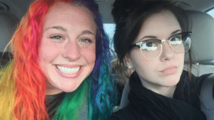 Rainbow girl vs. dark girl IRL meme template