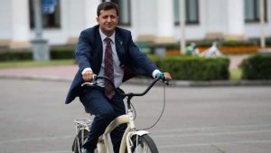 Zelensky riding bike Ukraine Shooting search meme template
